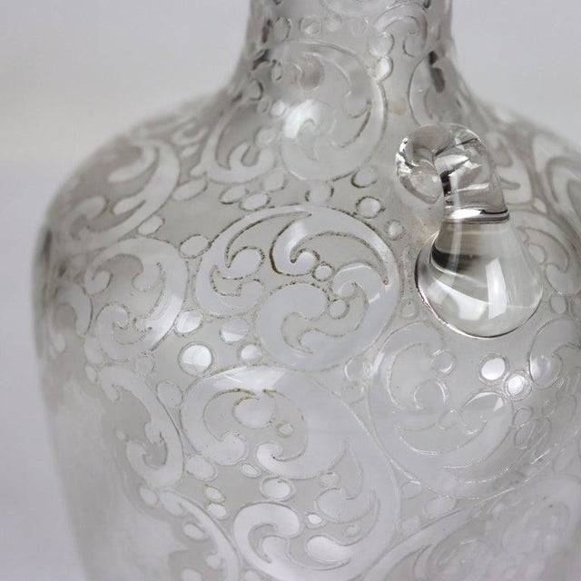Antique Floral Etched Glass Decanter With Sterling Silver Neck C1900 Measures - 13" x 3 7/8" x 3 7/8" An antique glass...