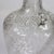 Antique Floral Etched Glass Decanter With Sterling Silver Neck C1900 Measures - 13" x 3 7/8" x 3 7/8" An antique glass...