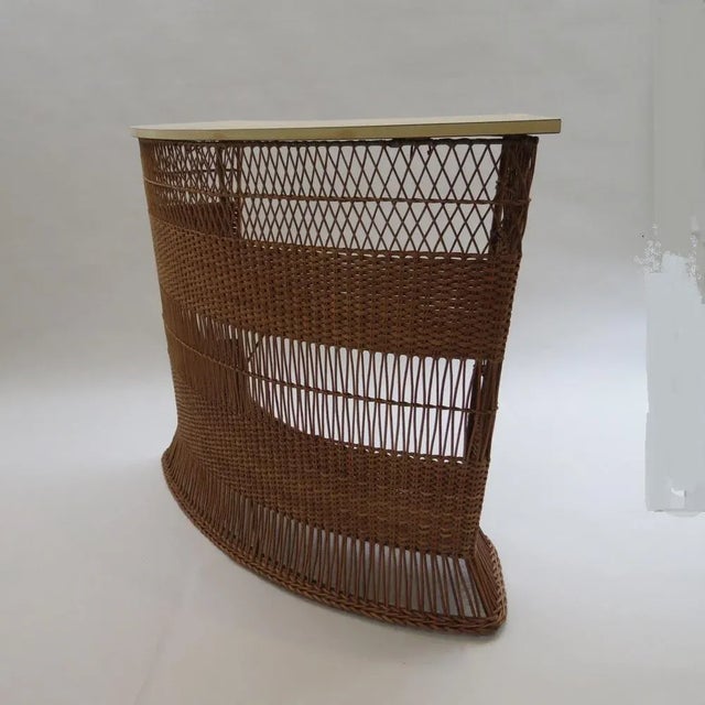 Wonderful stylish freestanding rattan drinks bar, dates from 1970s. Good heavy metal frame with rattan from and side and...