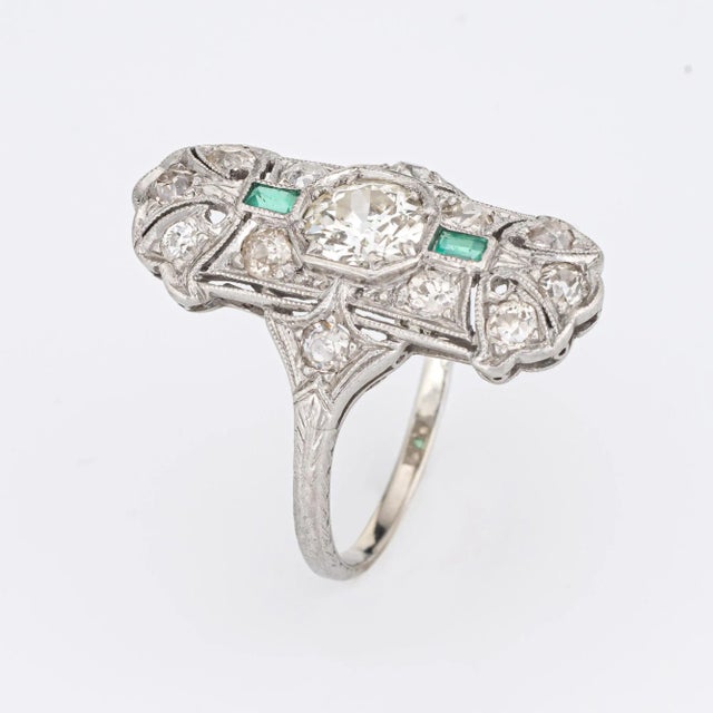 Finely detailed vintage Art Deco emerald & diamond ring (circa 1920s to 1930s) crafted in platinum. Centre set old...