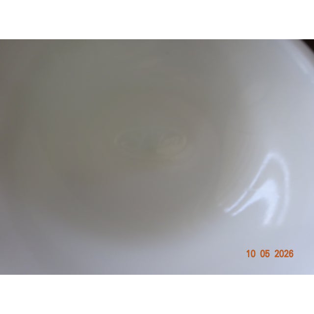Originally purchased in 1977 for dark brown Ethan Allen furniture. The white hobnail milk glass against the dark furniture...