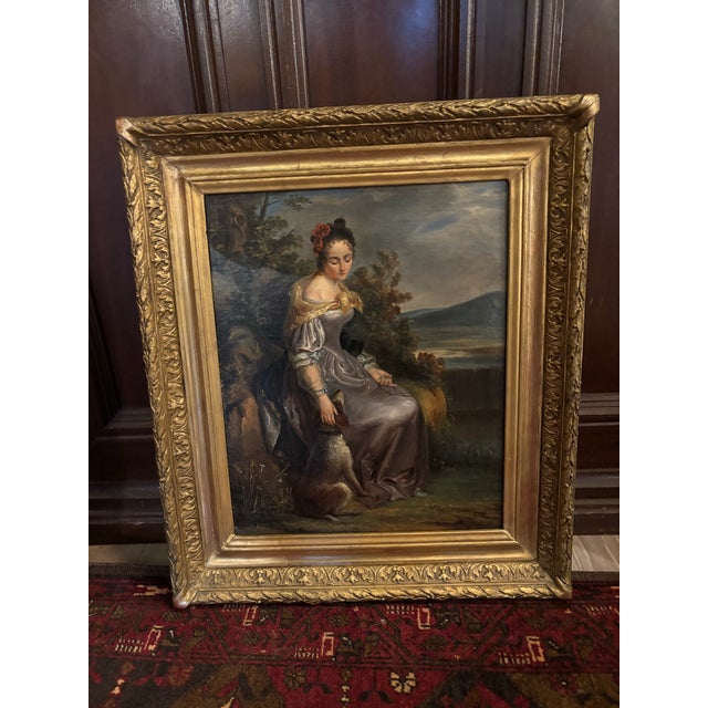 Charming mid-19th century European School oil on canvas, circa 1840–1860, depicting an elegantly dressed young woman...