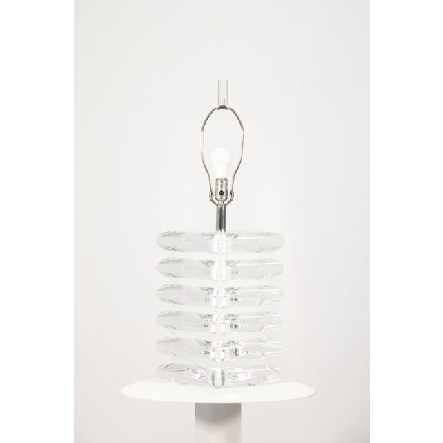 A striking pair of large vintage Clearlite Lucite table lamps by Bauer, showcasing bold sculptural form and timeless...