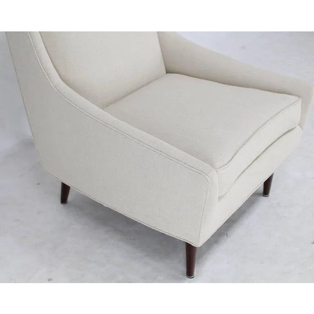 New upholstery Mid-Century Modern lounge chair. Perfect for a modern home.