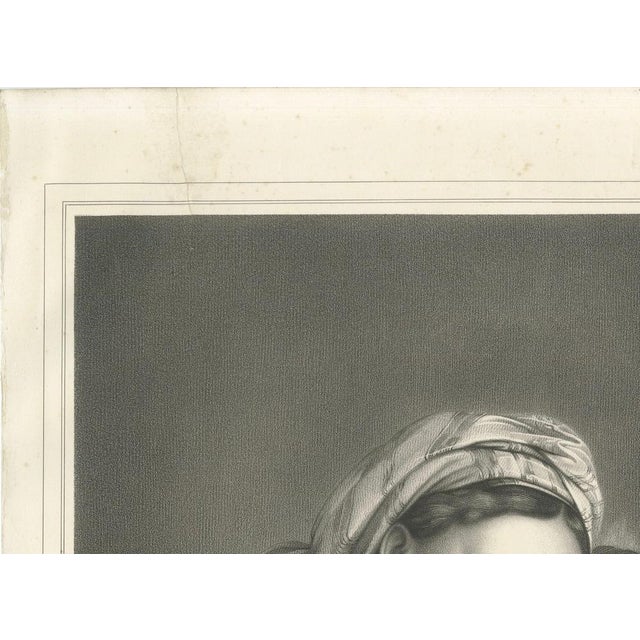 Madonna and Child Print after Raphael – La Vierge à la Chaise, 19th Century This exquisite 19th-century lithograph, titled...