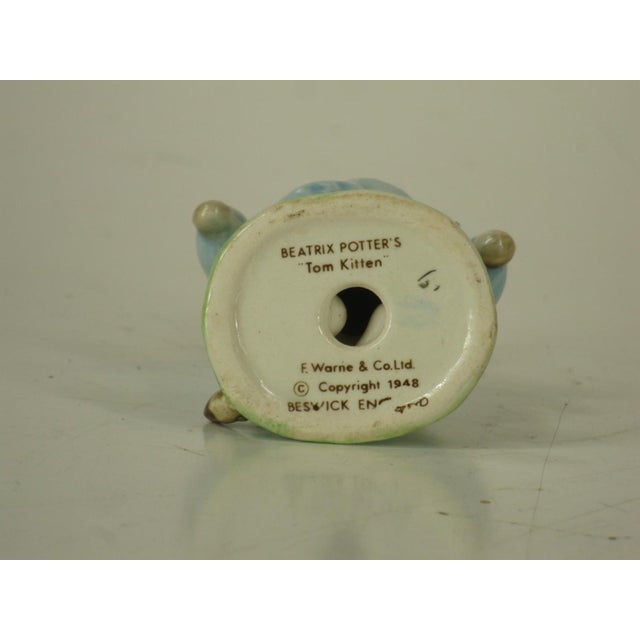 The Beatrix Potter TOM KITTEN & MISS MOPPET figurine is a collectible piece made of porcelain in England by BESWICK. This...