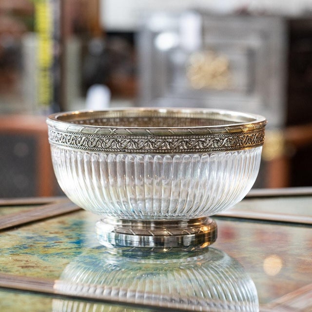 20th Century French Empire style silver large centerpiece bowl. The inverted fluted glass, mounted with a pierced silver...