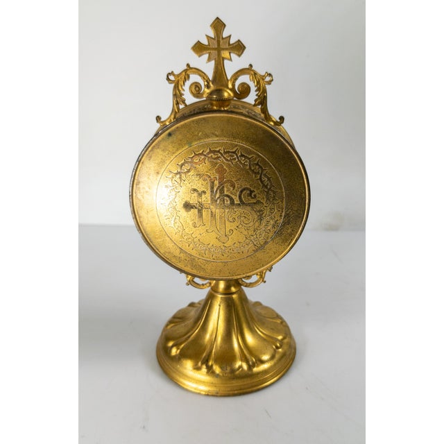 We are selling this small gilt brass metal monstrance. This monstrance may have been made as a traveling reliquary, it...