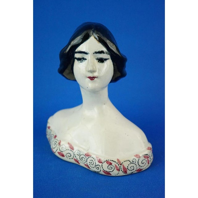 Item description: delightful glazed and vitrified ceramic bust, entirely modeled and decorated by hand, depicting the bust...