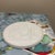 This piece is a classic Royal Copenhagen (or Bing & Grøndahl) bisque porcelain wall plaque titled "Winter". It is part of...