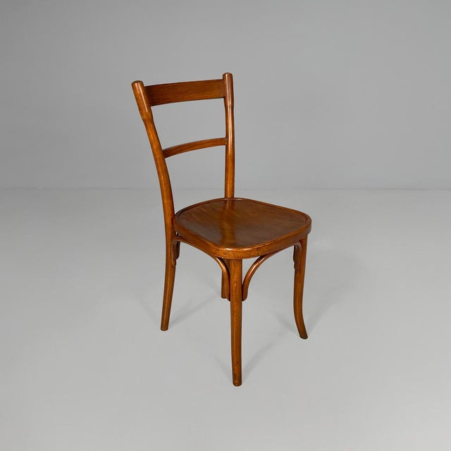Austrian chairs in wood by Thonet, 1930s Set of six chairs made entirely of wood. Features a contoured wooden seat, a...