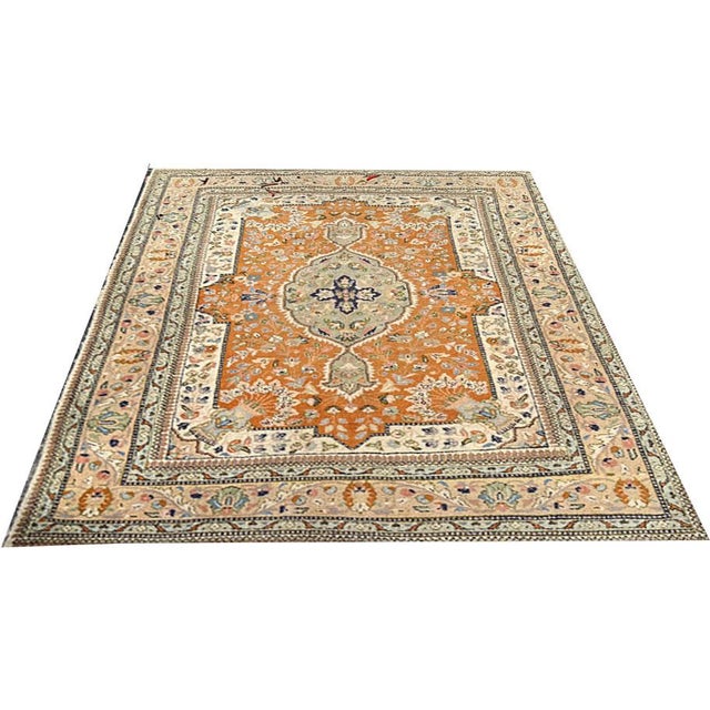 Uncover the essence of vintage charm with our 5' x 6' Decorative Persian Tabriz Area Rug, a stunning piece that brings a...