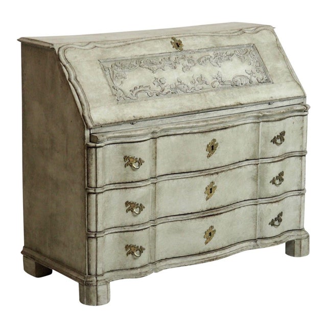 Beautiful 18th Century Scandinavian Slant top Secretary features ornate wood carvings on the drop-down top. Three drawers...