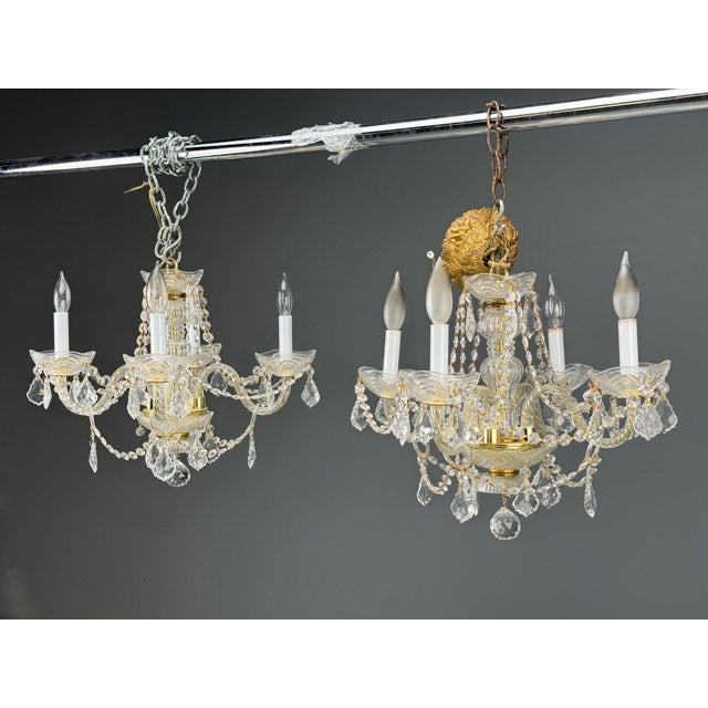 Maria Theresa Style, Custom Quality Venetian Chandeliers, Crystal, Brass, Italy, 1960s A fine pair of Venetian-style...