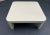 Contemporary 1980's Custom Coffee Table in a Glossy Cream Laminate Formica. Square shaped with rounded edges. Love the...