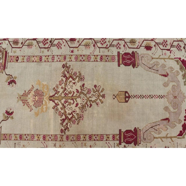 Early 20th Century Color Antique Oushak Rug With Columns, Chandelier & Vase Design For Sale - Image 10 of 13