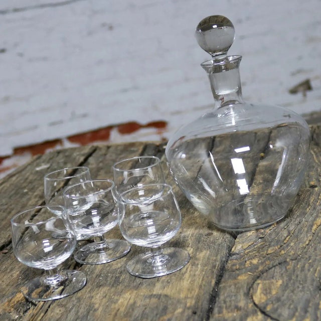 Handsome clear crystal Tinka Decanter Set with decanter and five glasses designed by A. D. Copier for Royal Leerdam...