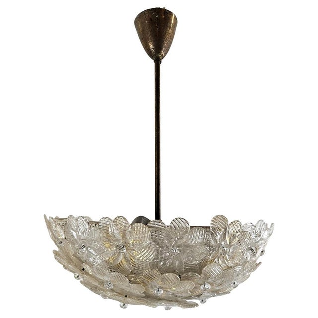 Handmade Murano glass chandelier produced by Barovier & Toso, Italy. The chandelier is constructed as a dome-shaped,...