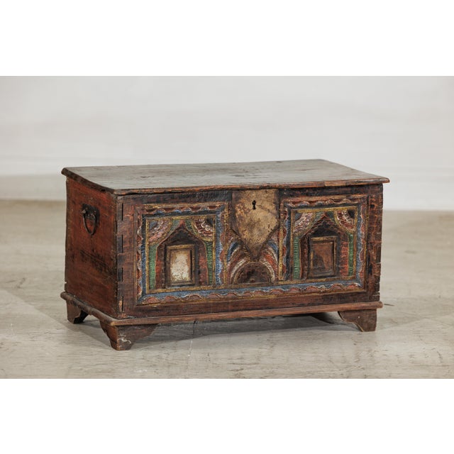 "About the Item This antique Indian chest, dating to the 19th century, captures the charm of regional craftsmanship with...