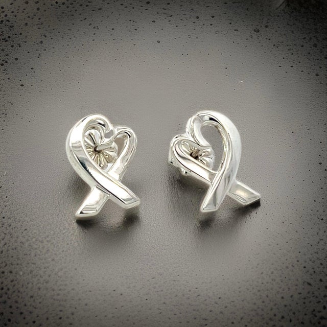 White Late 20th Century Tiffany & Co Estate Heart Pierced Earrings by Paloma Picasso Sterling Silver, A Pair For Sale - Image 8 of 12