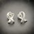 White Late 20th Century Tiffany & Co Estate Heart Pierced Earrings by Paloma Picasso Sterling Silver, A Pair For Sale - Image 8 of 12