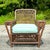 Experience timeless comfort with our American-style Vintage Coastal Palecek President’s Stick Rattan Lounge Chair....