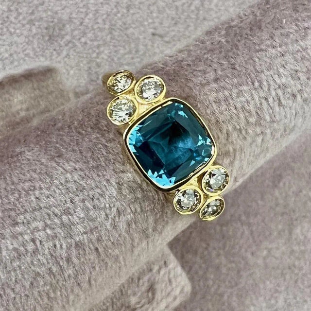 Created in 18 karat yellow gold Blue Topaz 1.70 carats approx. Diamonds 0.35 carat approx. Ring size US 7, can be sized...
