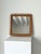 A square vintage wall hung mirror featuring a rattan and bamboo frame with looped detail, attributed to italian designer...