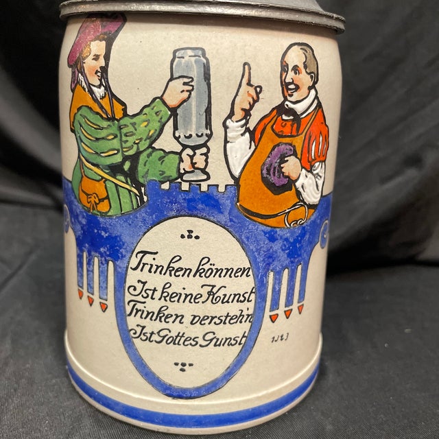 Illustrated with two portly beer hall patrons in Seventeenth Century attire, and an inscription I can't read. Found at the...