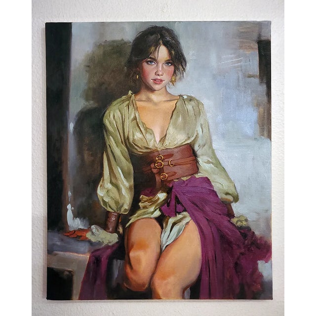 "Girl in Green and Maroon" radiates a striking balance of sensuality and restraint. The subject’s vivid blue eyes draw...