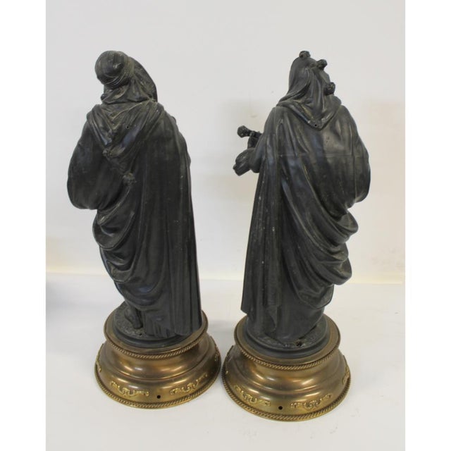 Decorative pair of French musician figures in patinated spelter, after models by Auguste-Joseph Peiffer (1832–1886). The...
