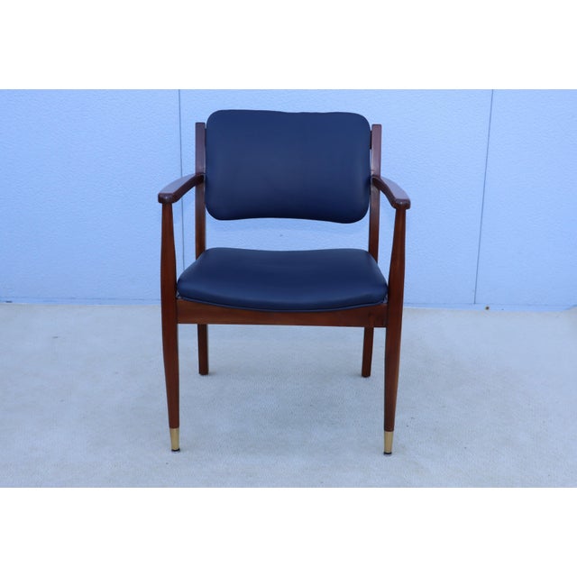 1960's mid-century modern walnut and brass armchairs with new blue leather upholstery, newly restored and re-upholstered...