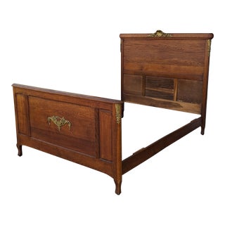 Antique Victorian Tiger Oak Full Sized Bedframe With Brass Floral Embelishments For Sale