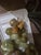 String of jade marbles in the image of a bunch of grapes