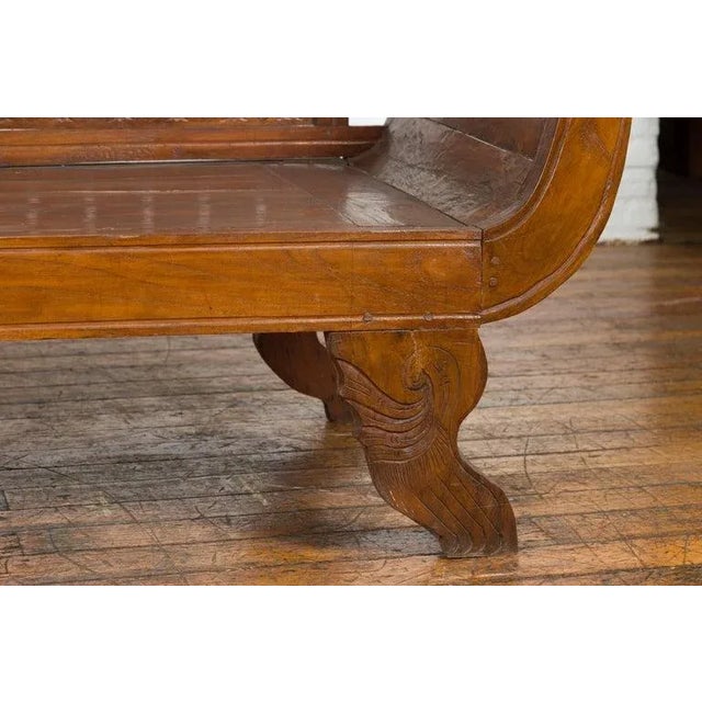 Brown Early 20th Century Plantation Javanese Teak Settee with Carved Décor & Out-Scrolling Arms For Sale - Image 8 of 12