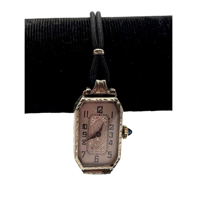 Original 1925 W.C Company Swiss-made Art Deco ladies' watch is a striking piece, featuring a 14K white gold-filled case...