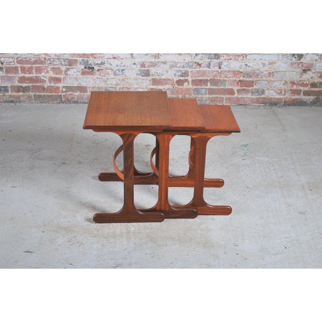 Mid Century G-plan Fresco teak nest of tables, circa 1960s. Signs of use commensurate with age. W 56cm D 40.5cm H 52cm