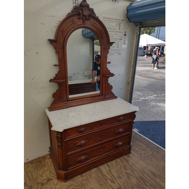 Late 19th Century Victorian Walnut Marble Top Dresser with Carved Pulls