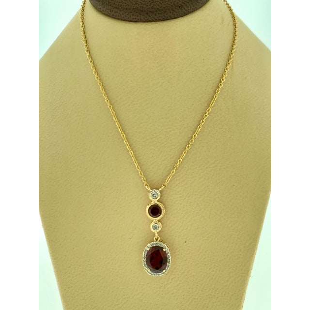 Gemstone 6 Carat Oval Shape Garnet and 0.6 Carat Diamond Necklace in 14 Karat Yellow Gold For Sale - Image 7 of 18