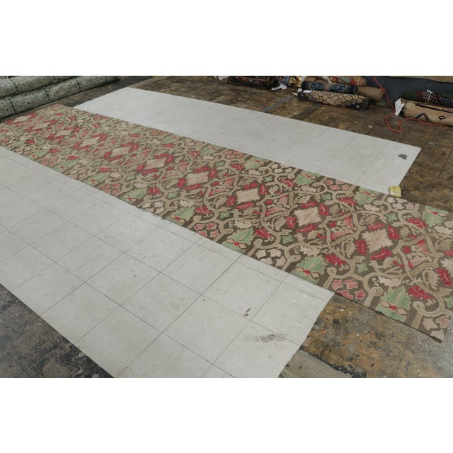 Originating from China, this wool runner features an all over field design inspired by 18th century Aubusson masterpieces...
