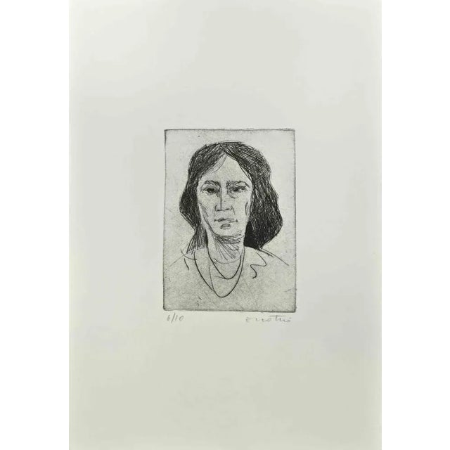 Woman is an Etching realized by Enotrio Pugliese in 1963. Limited edition of 10 copies numbered and signed by the artist....