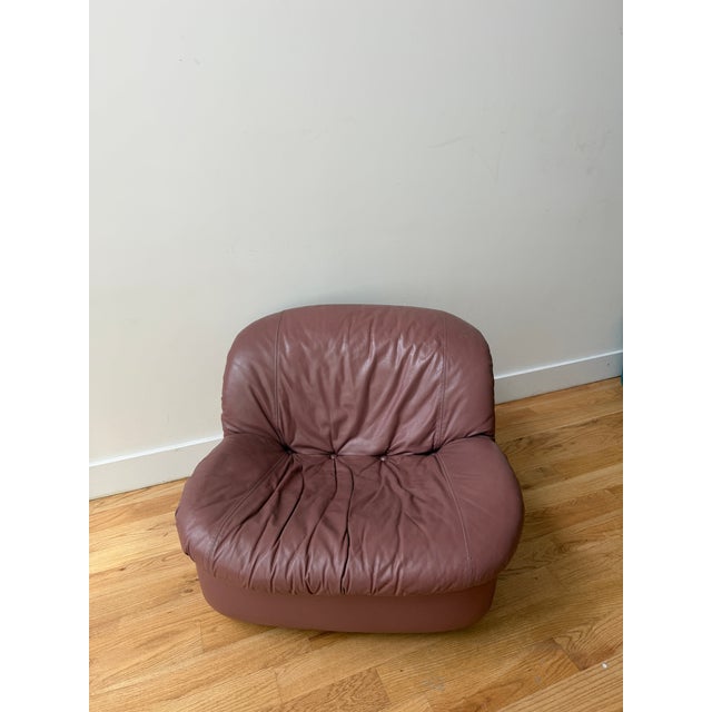 A striking matching pair of original Burris Industries lounge chairs, manufactured in 1986–1987 and preserved in...