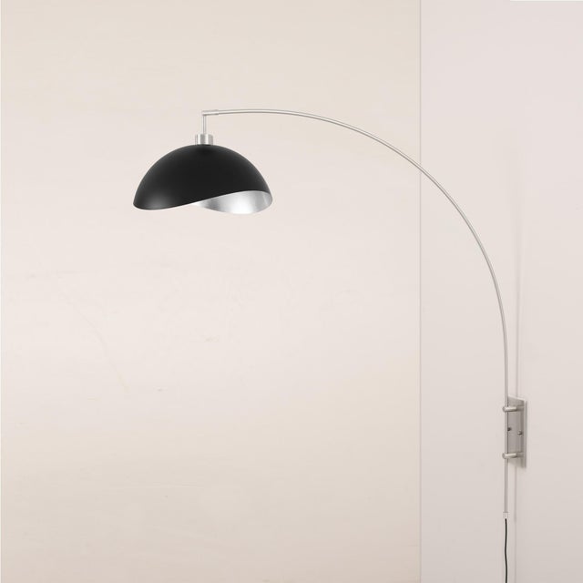 The Luna Bella Wall Arc Lamp is a striking piece designed to bring modern elegance into your living spaces. With its Satin...