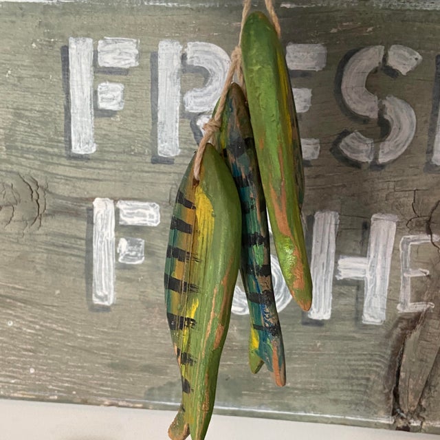 Rustic hand painted sign “Fresh Fishermen” and three carved fish all by artist Len Skinner. Perfect for your kitchen wall...