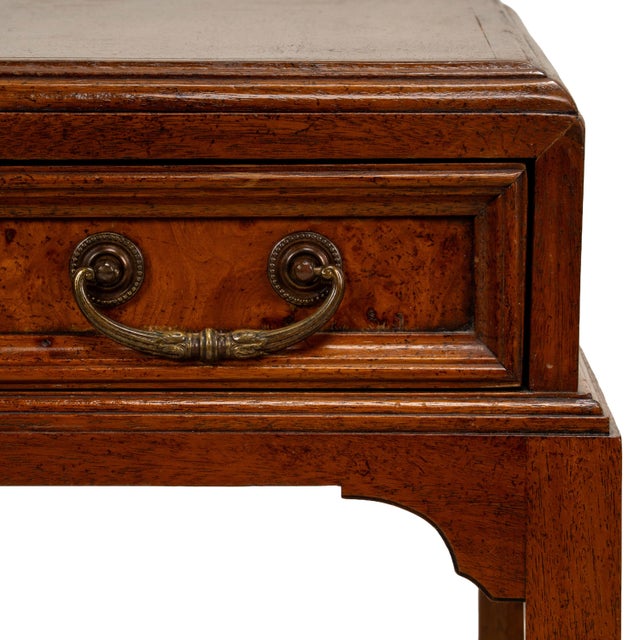 A refined pair of vintage nightstands by Fine Arts Furniture Co., crafted in walnut with beautifully figured burl veneer...