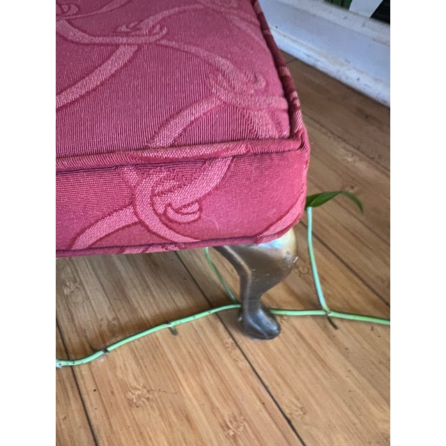 Up for consideration is a beautiful vintage brass footed foot stool with a red cushion. This is a lovely piece and a great...