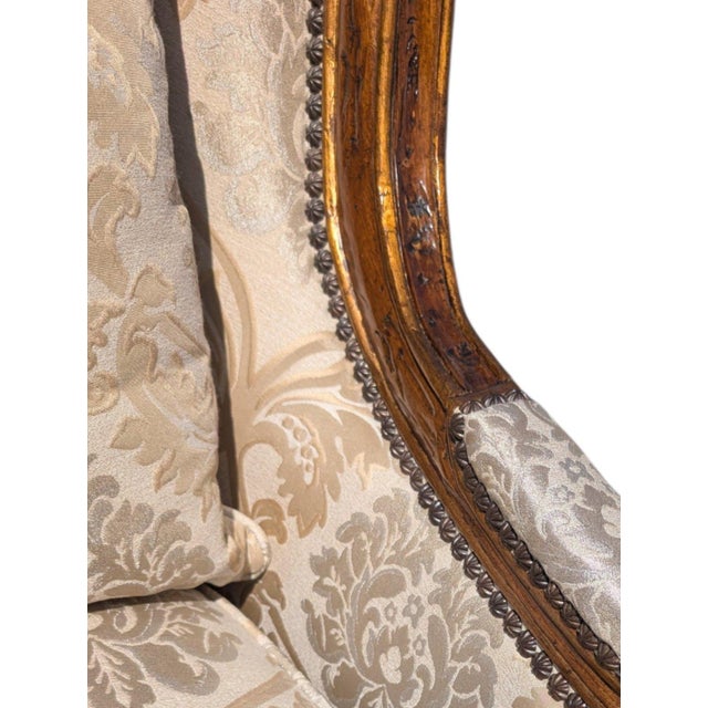 Late 20th Century French Provincial Louis XV Style Carved Wingback Bergère Chair in Damask For Sale - Image 12 of 12