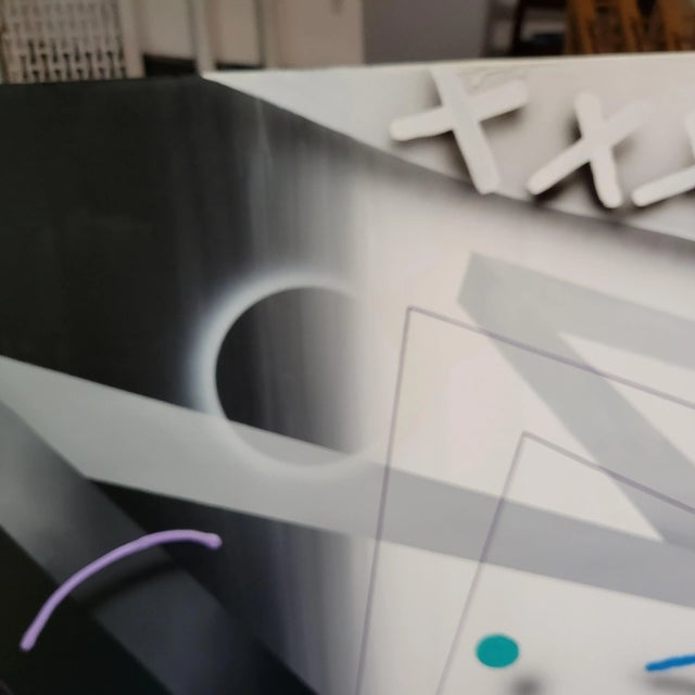 Great abstract painting typical of the style in the 80's, done in geometric shapes and airbrushing. Second canvas is...