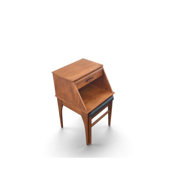 This small telephone bench was made by the Chippy Telephone Seat Company in England during the 1960s. The teak bench...