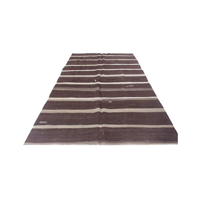 Vintage handwoven decorative kilim rug from Afyon region of Turkey. Approximately 50-60 years old. In very good condition.